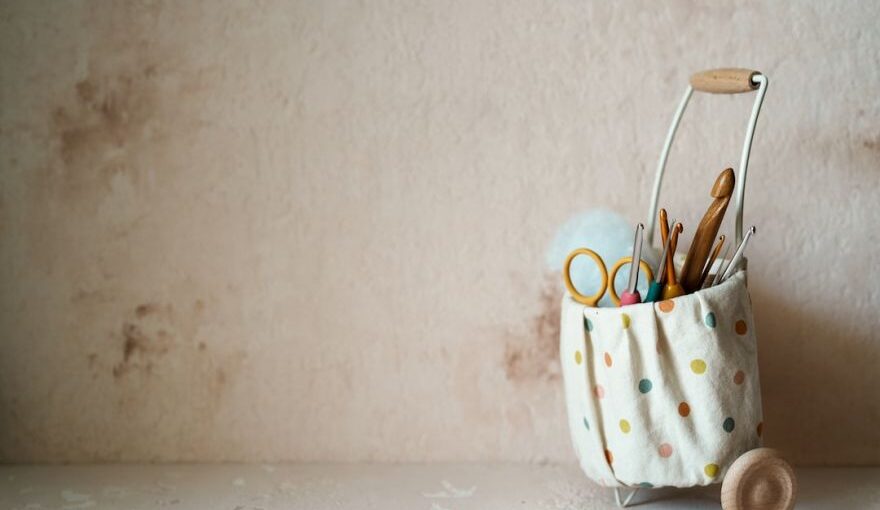 Yarn Tools - a polka dot bag with a pair of scissors in it