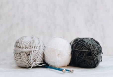Self-striping Yarn - white, gray, and black yarns