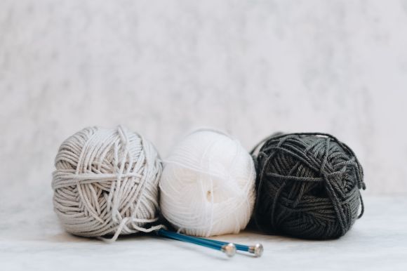Self-striping Yarn - white, gray, and black yarns