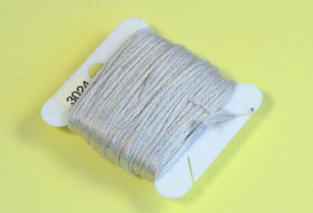 Yarn Tools - blue yarn on white plastic pack