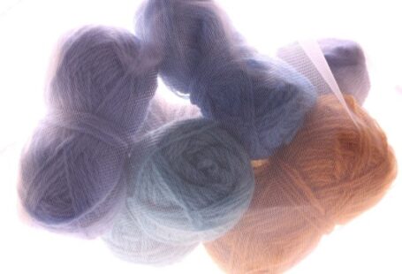 Wool Yarn - three skeins of yarn sitting next to each other