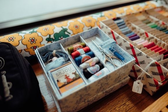 Wool Yarn - a box filled with lots of different types of thread