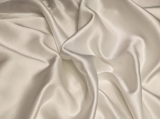 Silk Satin - white textile on brown wooden table